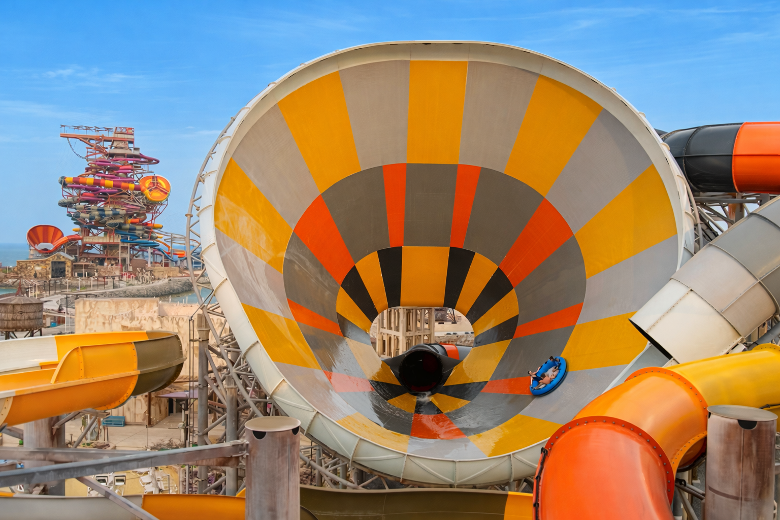 Huge funnel slide in a sunny water park in the Middle East