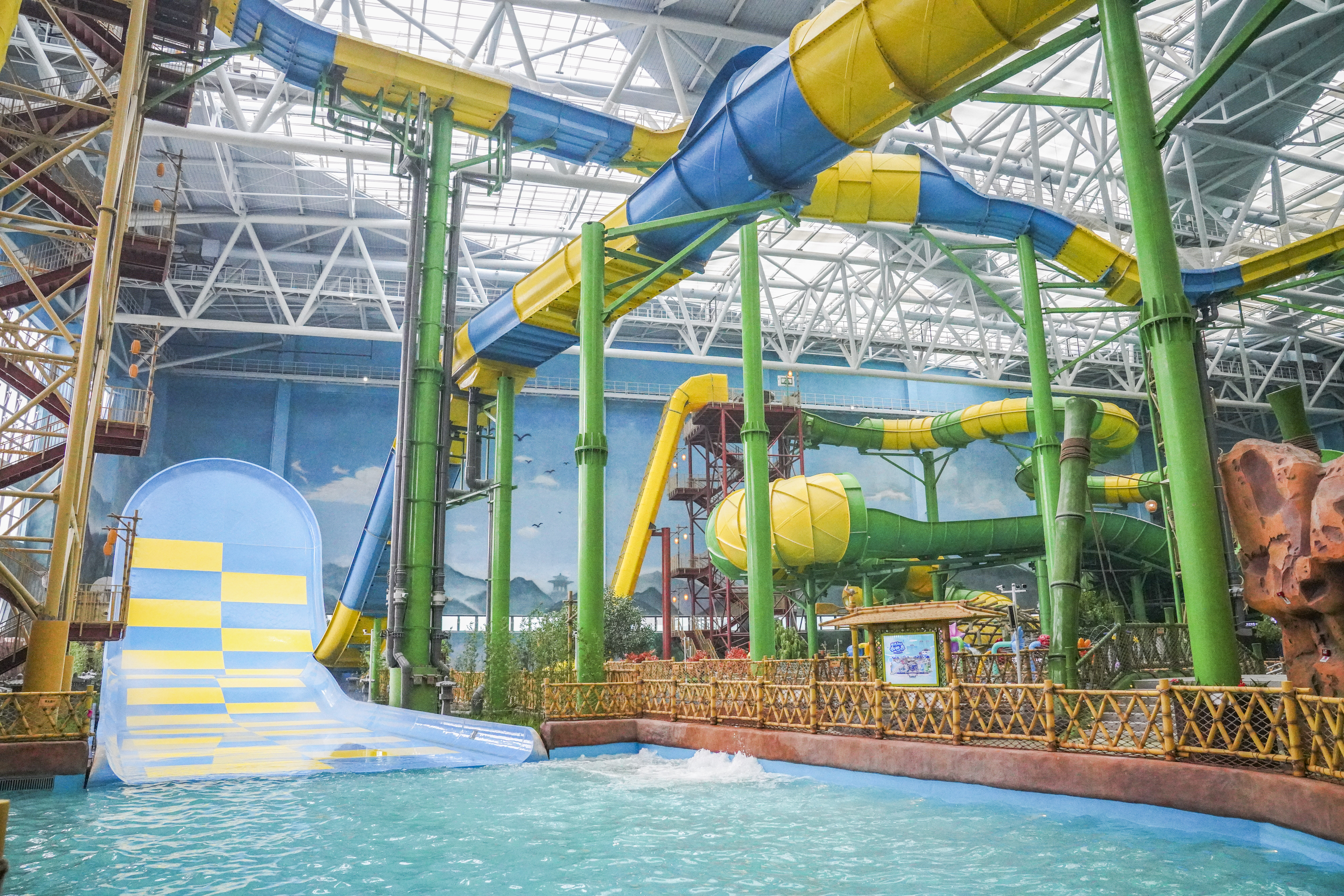 An indoor water park with a Boomerango wall
