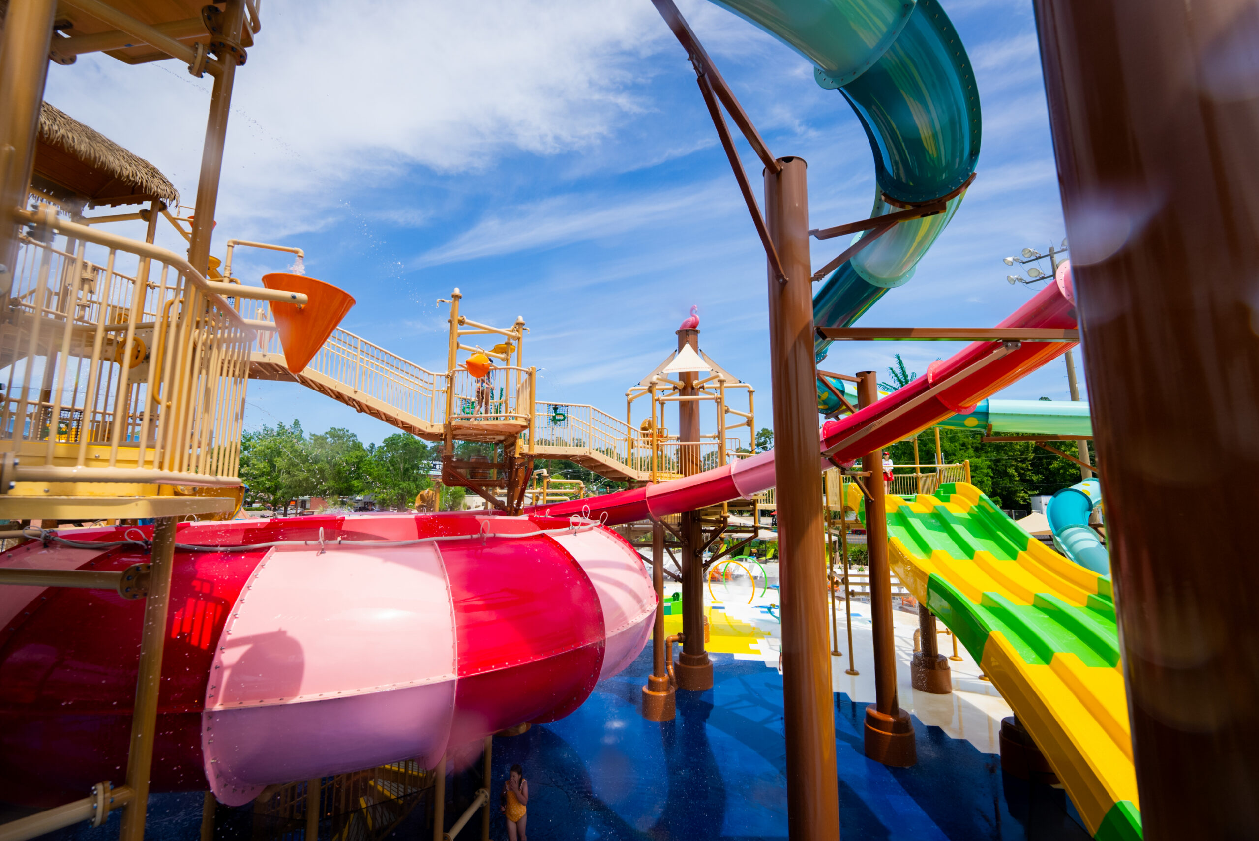 A water park with a bowl ride in the foreground