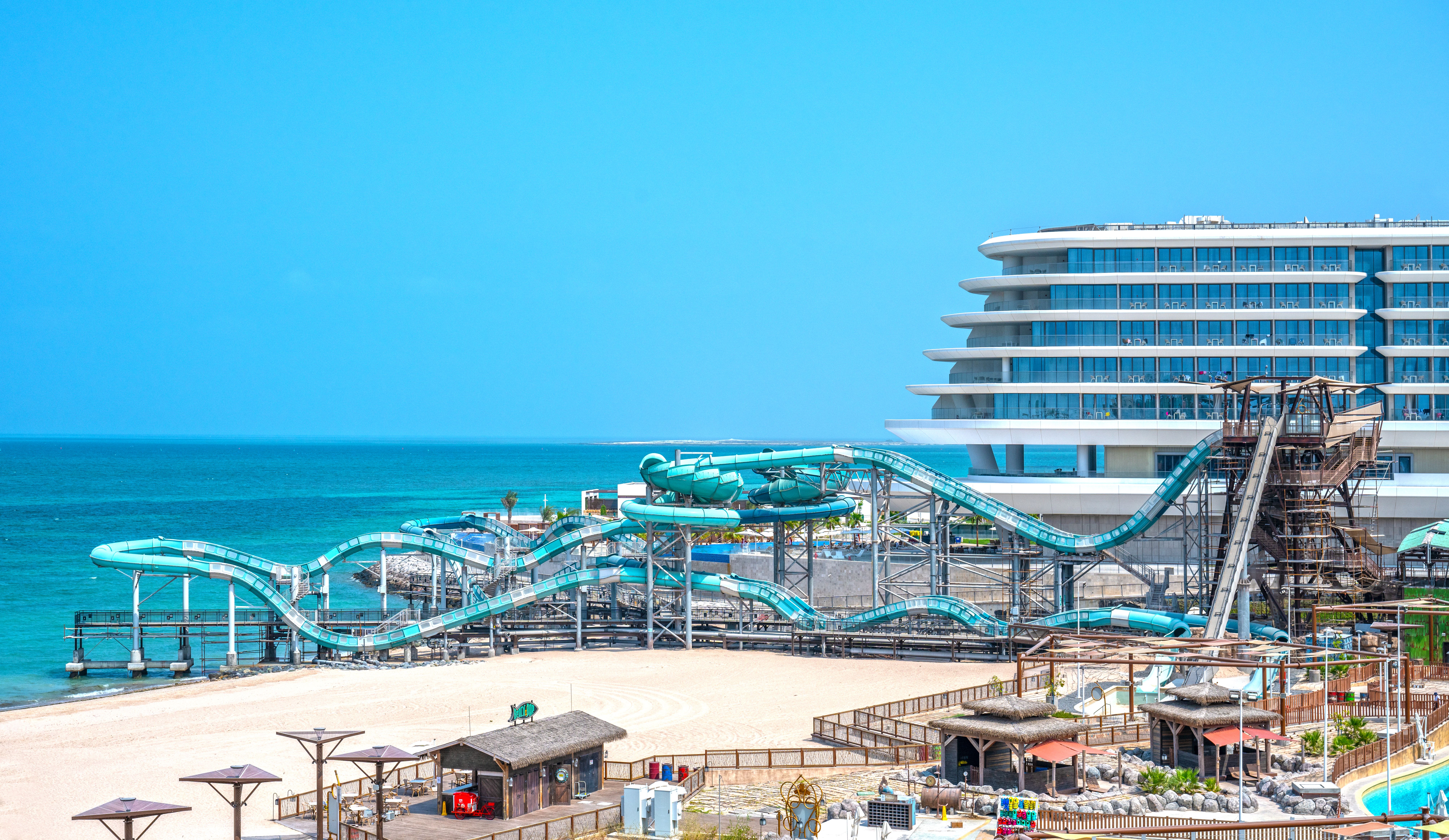 A water coaster against the backdrop of the sea and the desert