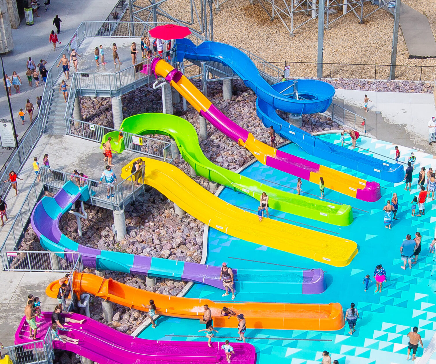 A row of mini water slides for kids