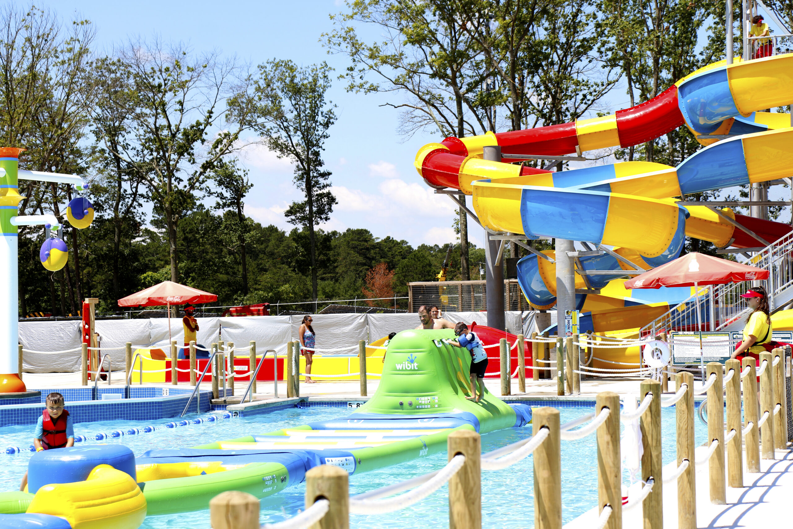 A colorful water park with water slides