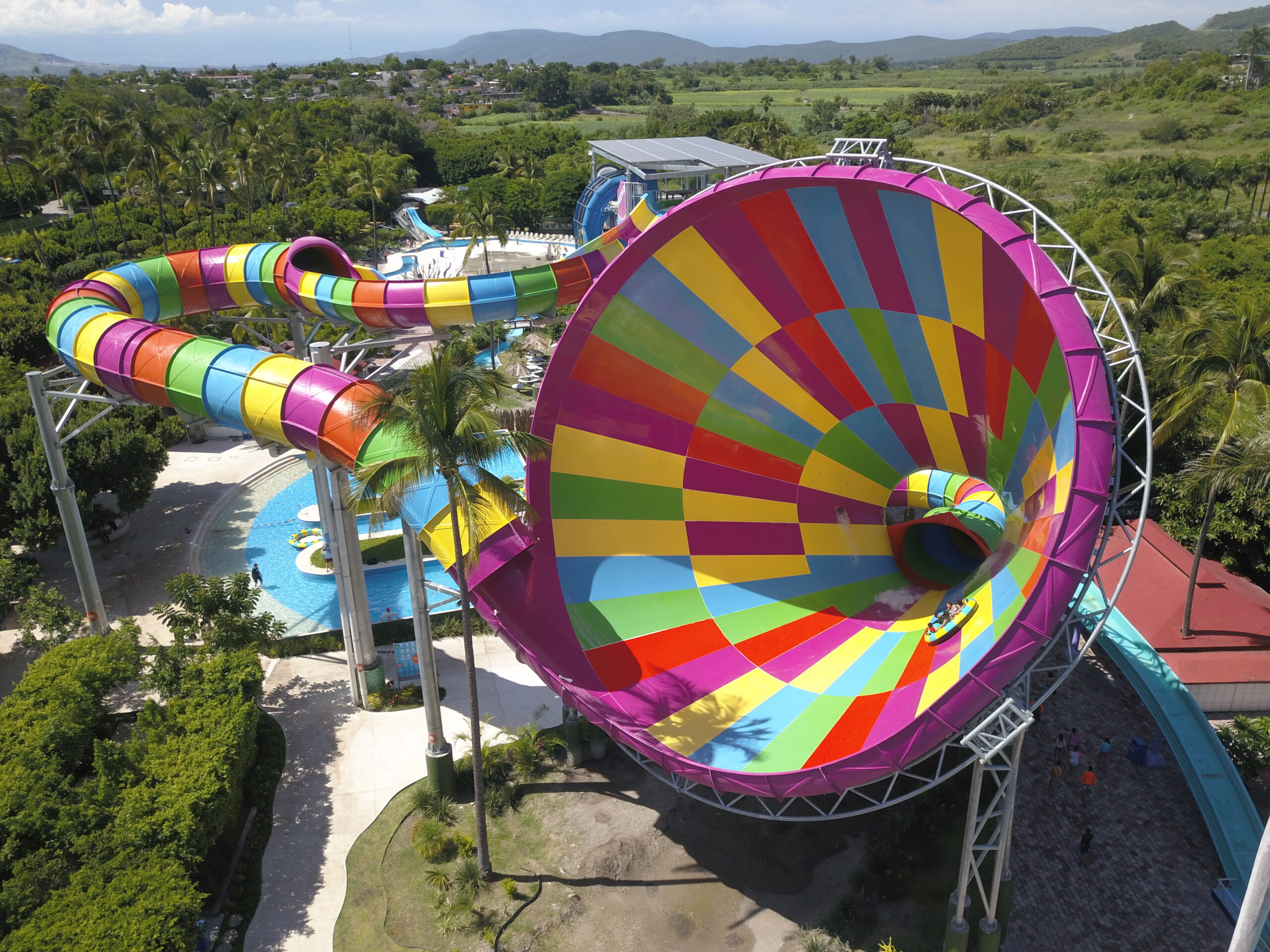 A huge, colorful funnel water slide