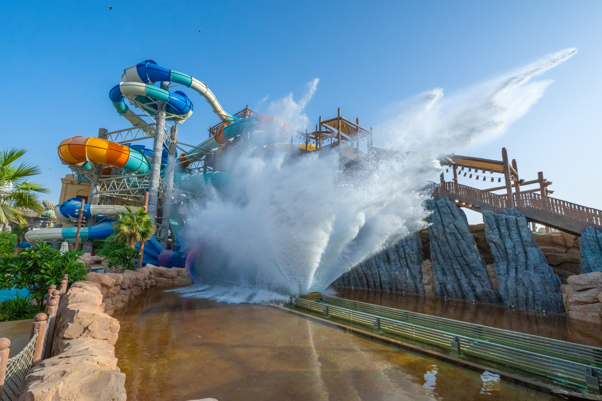 Enormous Shoot the Chute splash at Yas Waterworld