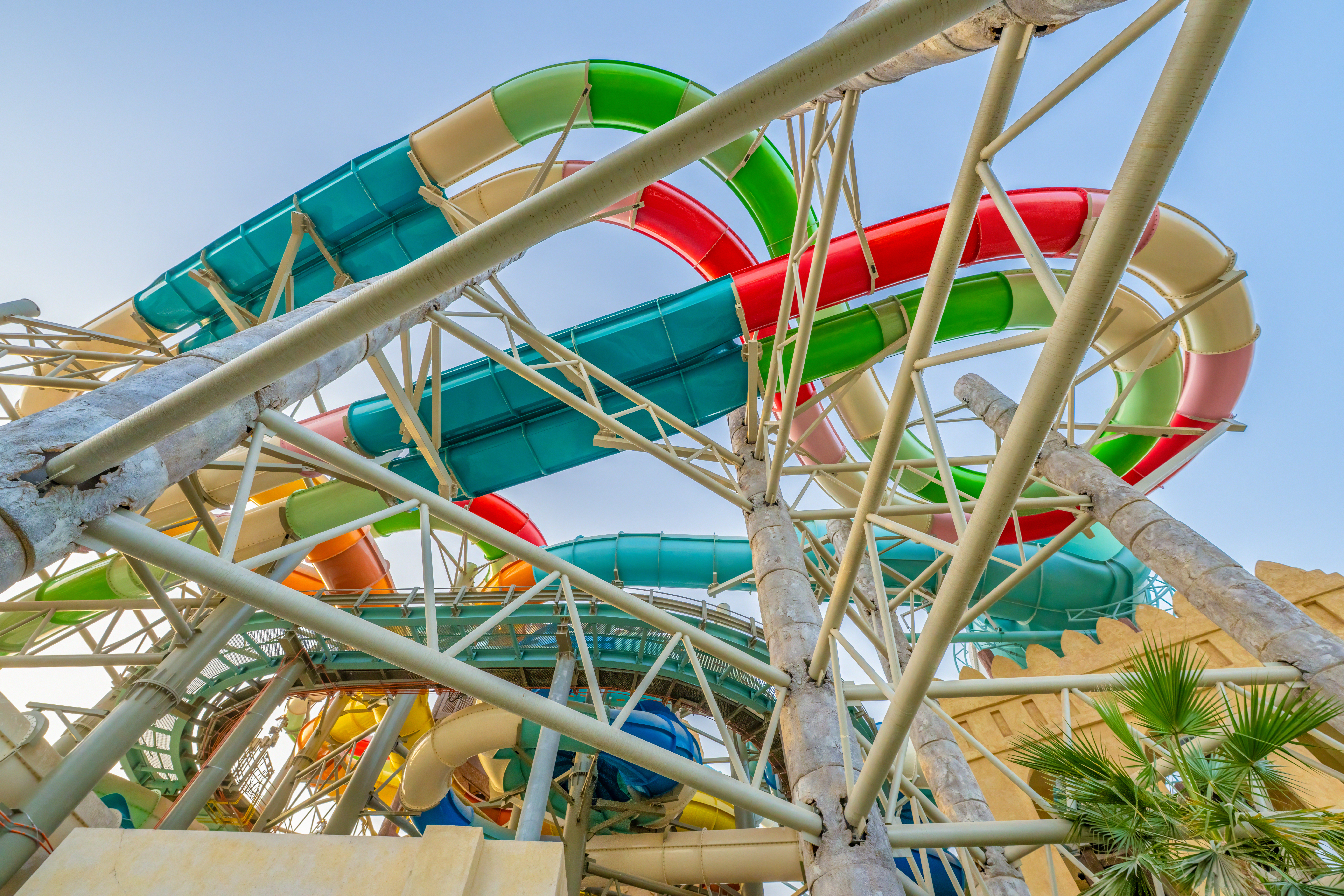 Looking up at colour and winding water slides