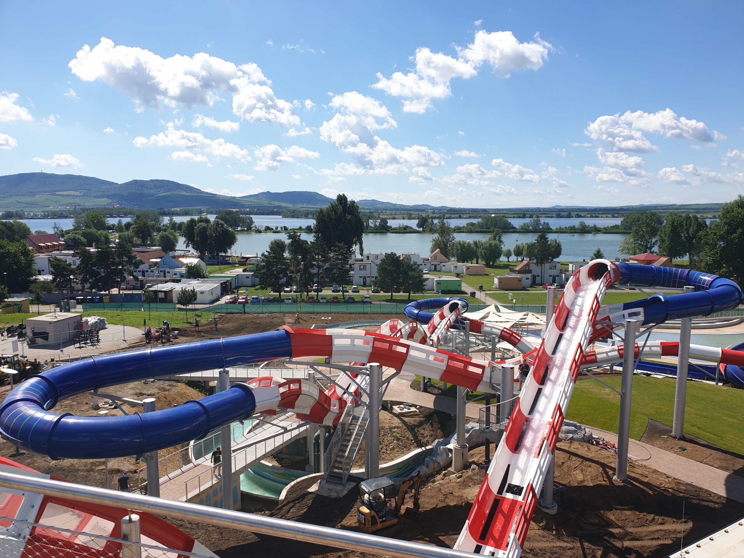 Overview a differently shaped slide with blue, red and white colors establishing