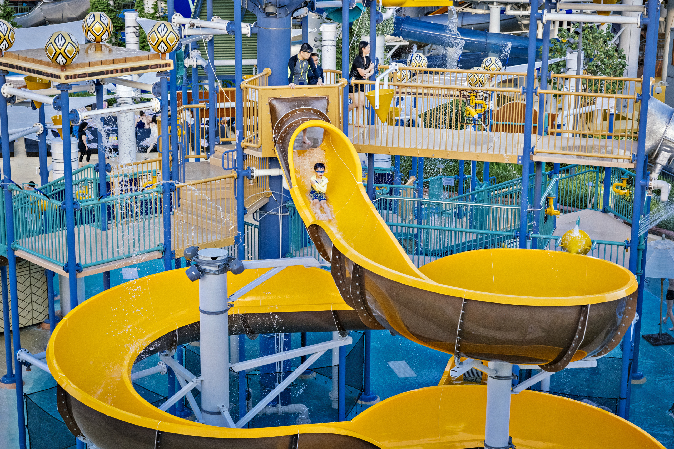 Yellow body slide for children at Studio City Water Park