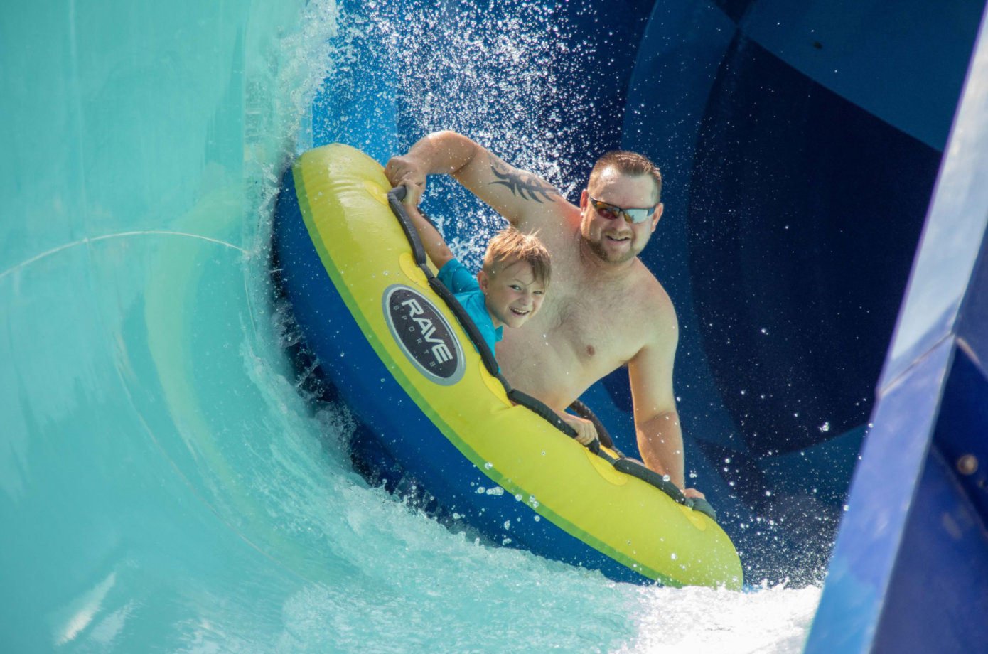 Family raft tail spin WhiteWater West water slides