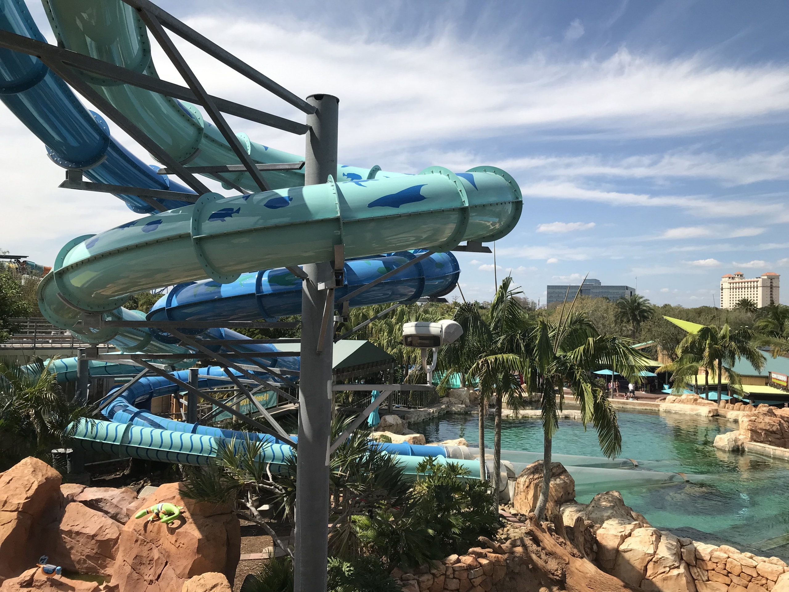 Blue water slides that plunge into water