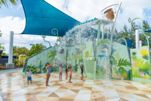 Children at an aquatic play structure