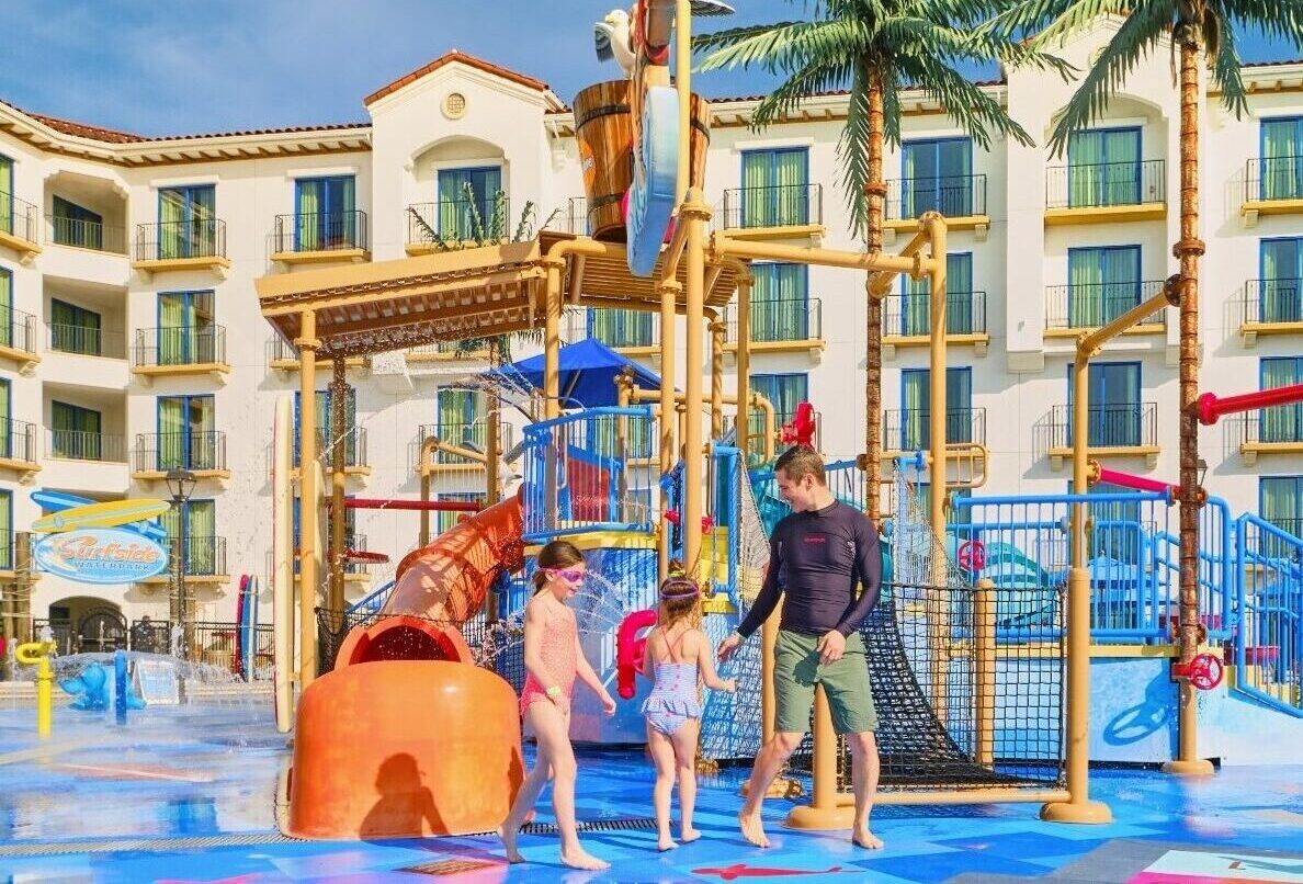 Father and two children at hotel water park
