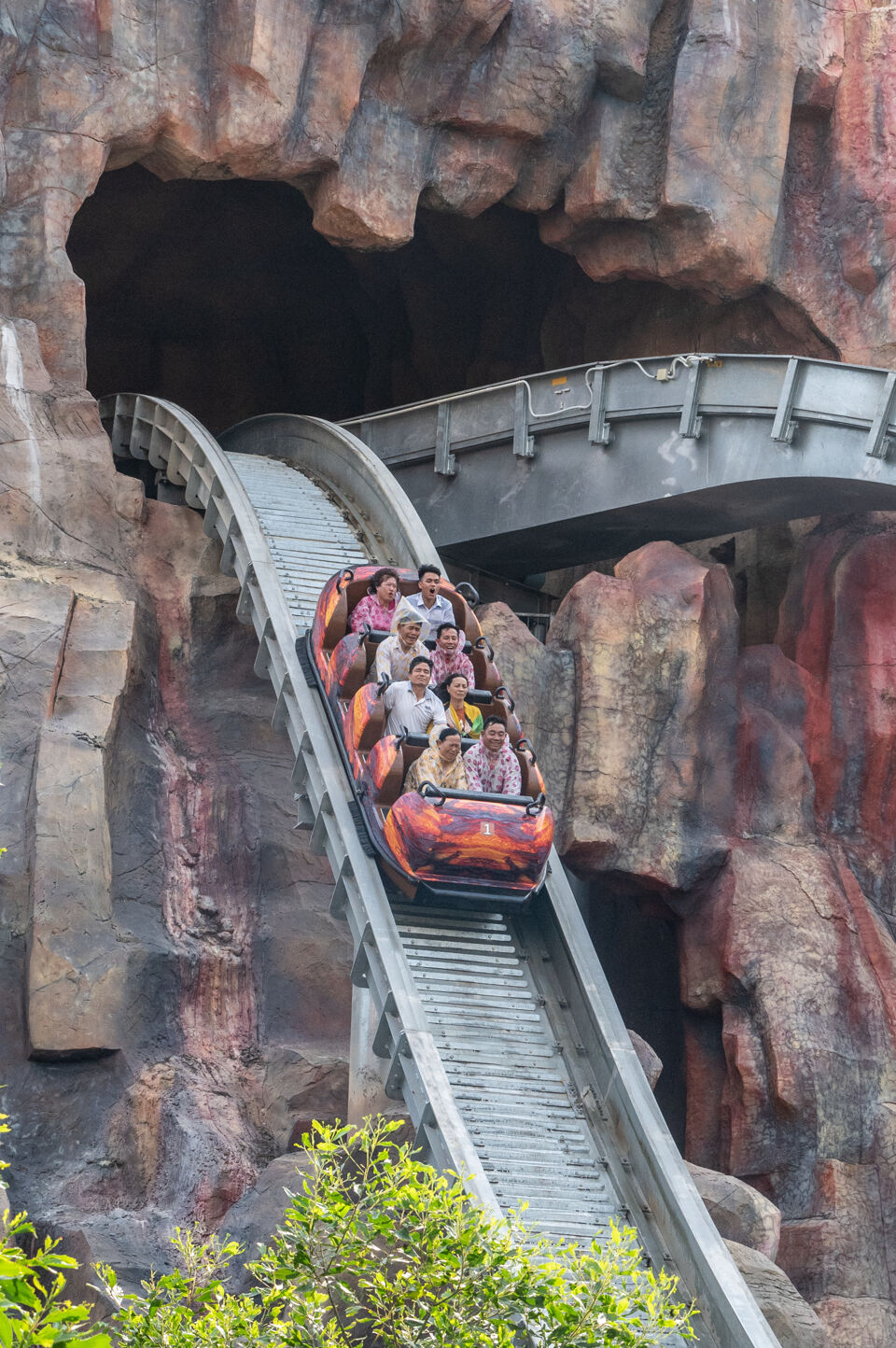 A Super Flume vehicle plunging down a hill