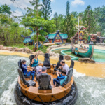 People on a round raft enjoying a water ride