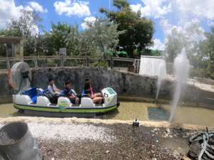 Passengers in water ride boat