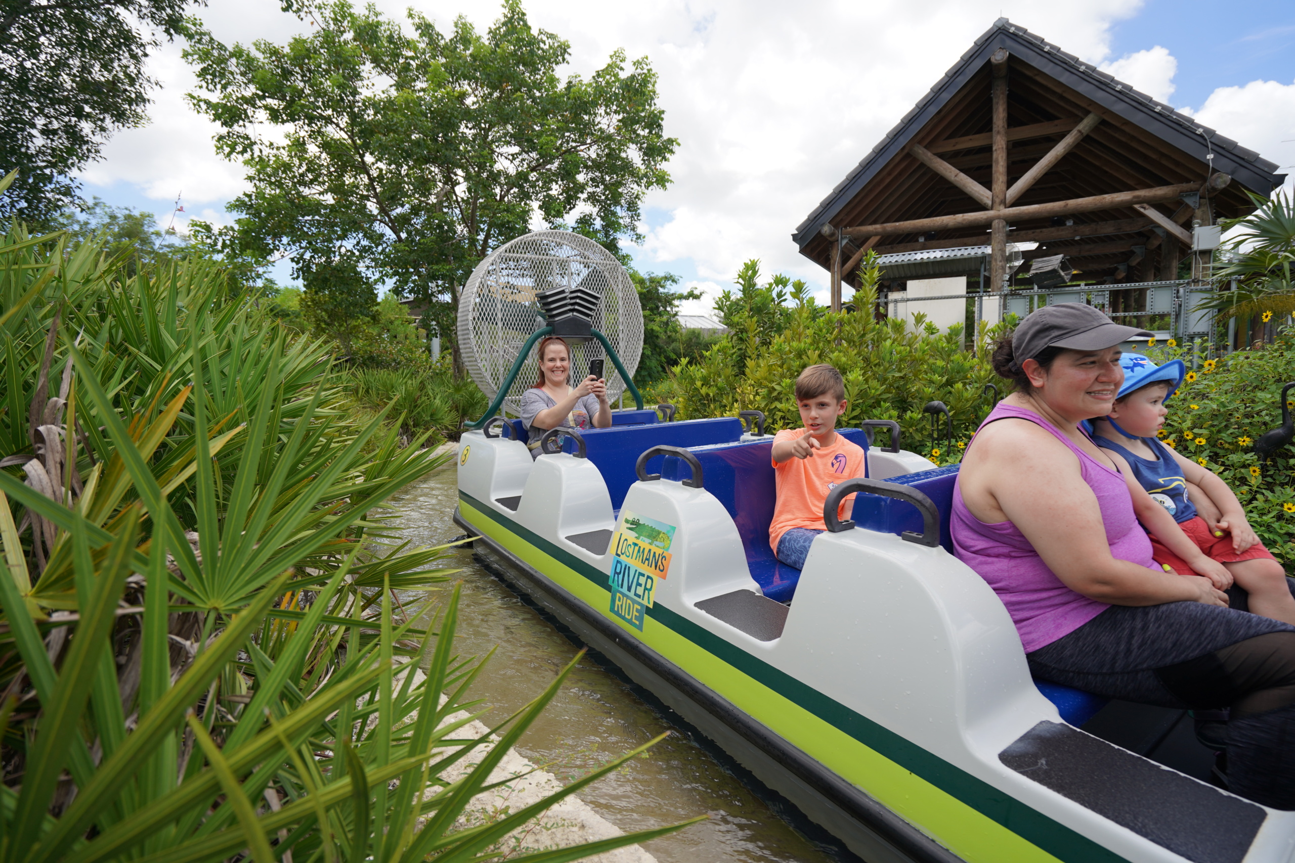 Passengers in water ride boat