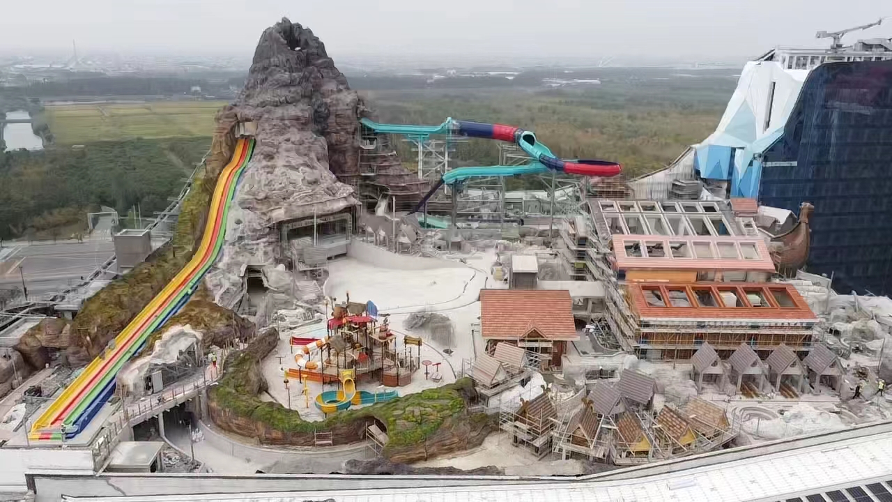 Water park progress photo with artificial mountain
