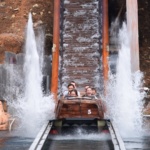 People on a water ride after the drop
