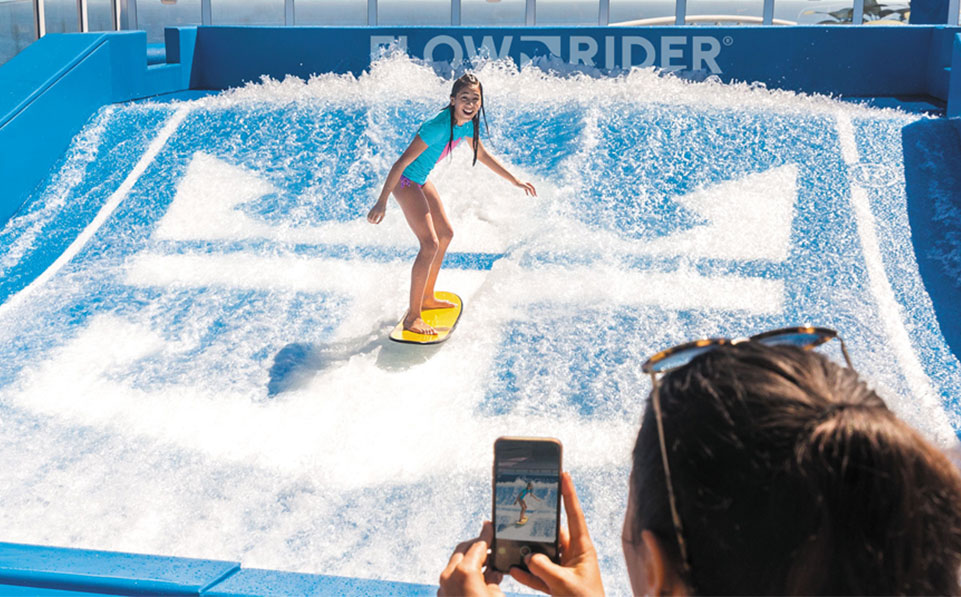 Flowboarder on the back of a Royal Caribbean cruise ship
