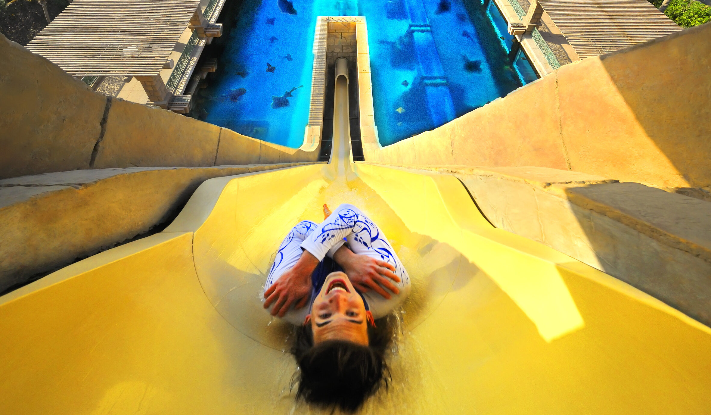 A woman in a freefall water slide