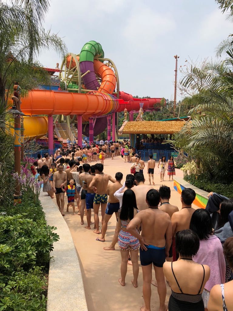 Water park guests waiting in line for SlideWheel water slide