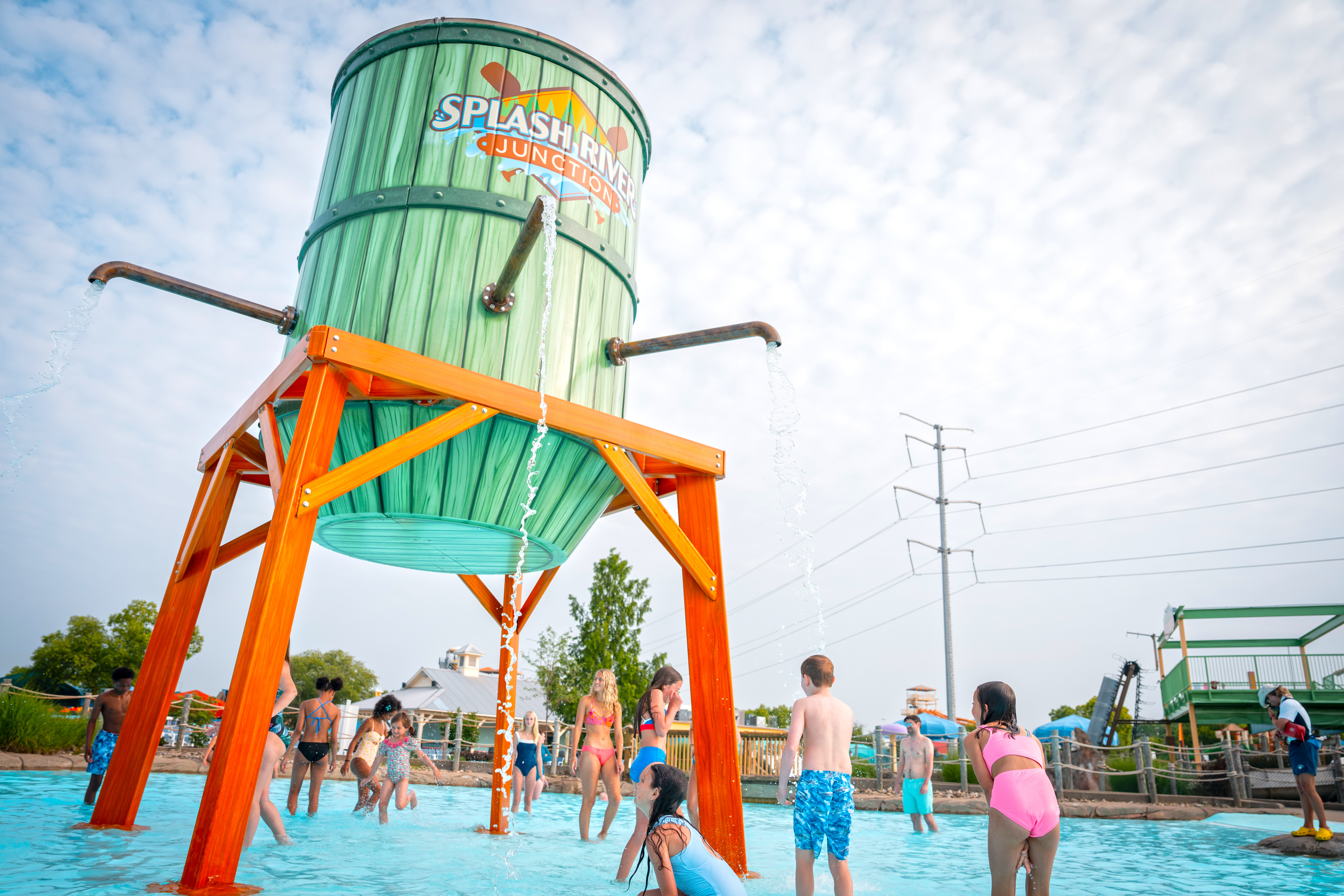 Kids running in around AquaSplash toy at Kings Island