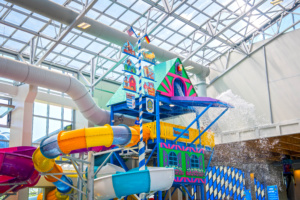 May Pole and cuckoo clock tower at an indoor water park