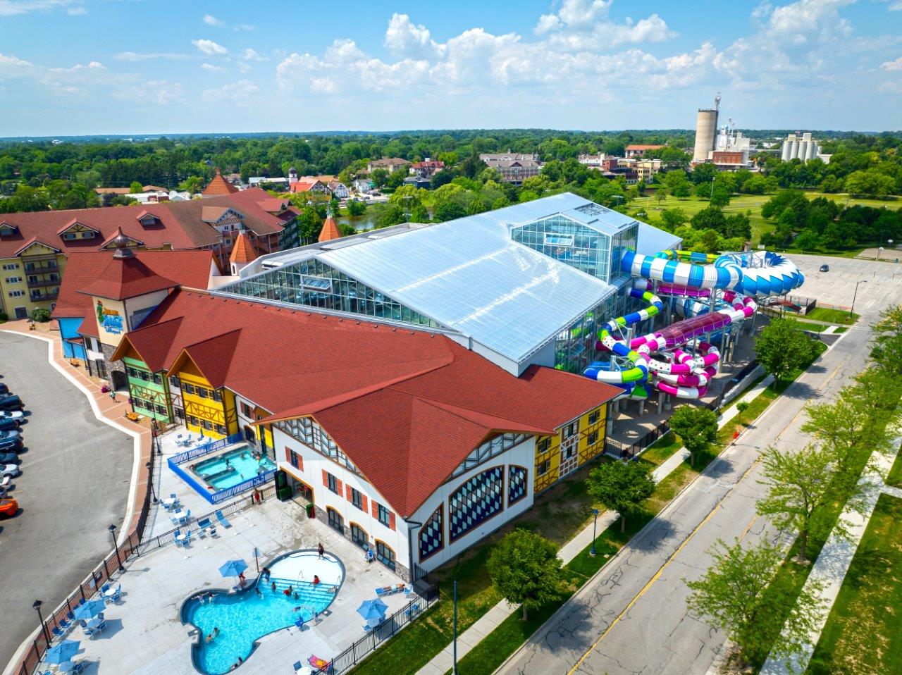 Hotel with an indoor water park attached and extruding water slides