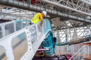 Man inspecting a water slide