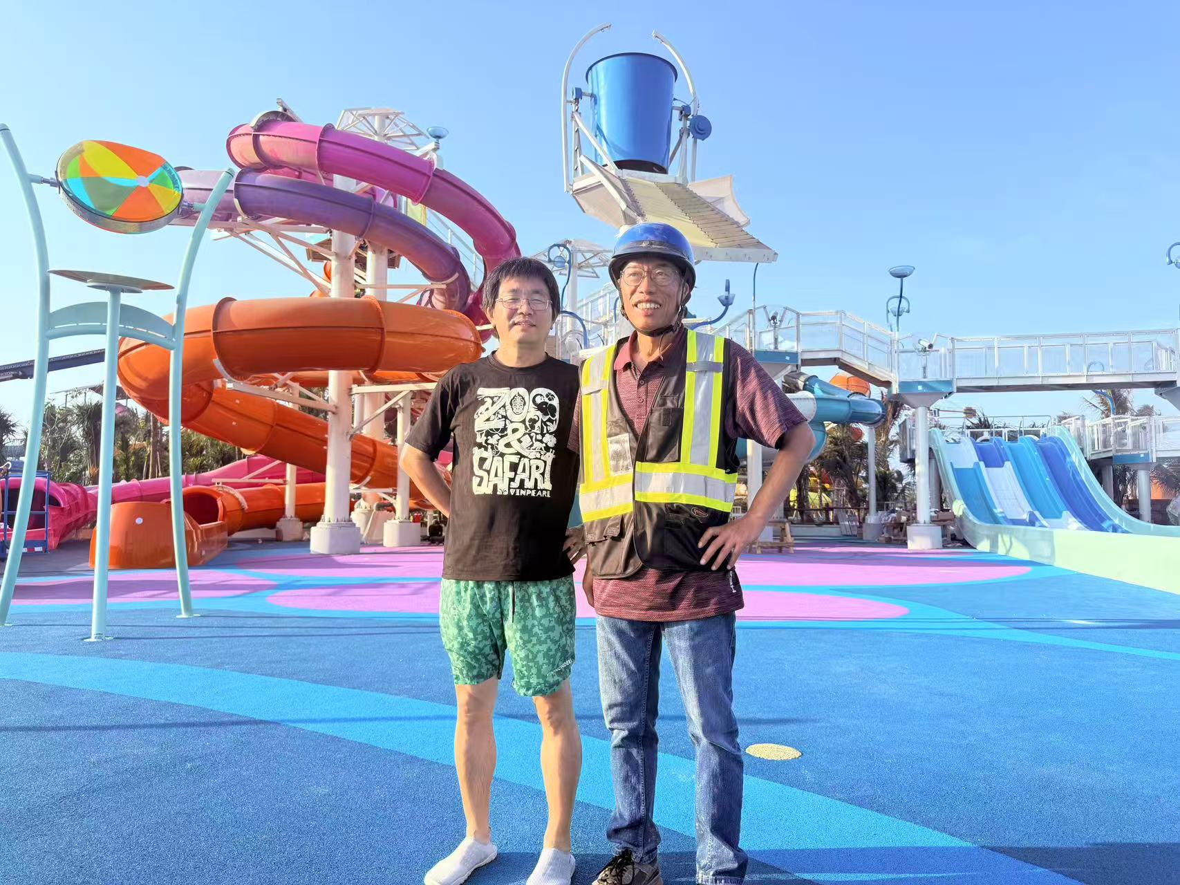 Two men working at a water park