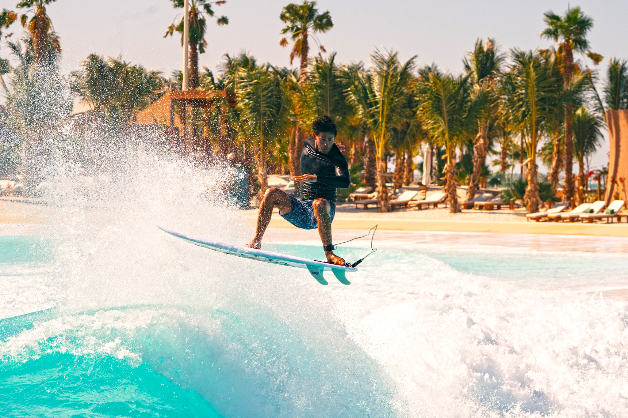 Surfer carving a wave at Endless Surf, Adrena at The Red Sea, Saudi Arabia
