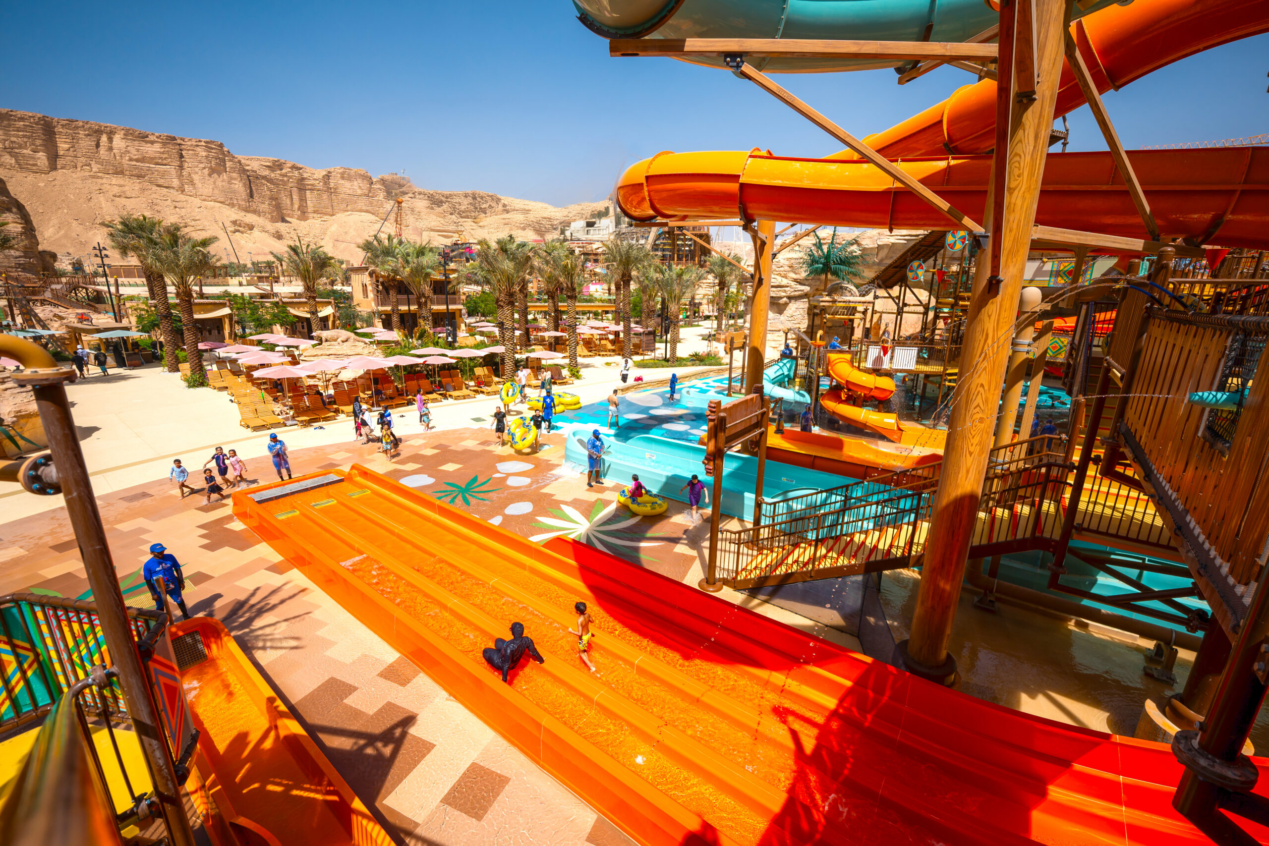 Water slides on an aquatic play structure