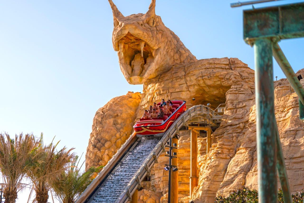 A Shoot the Chute ride coming down the hill