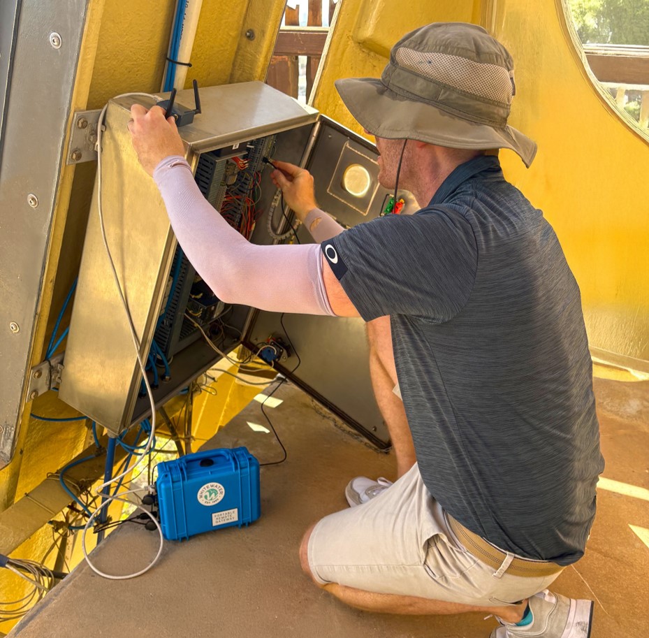 Man working on the back side of AquaLaunch
