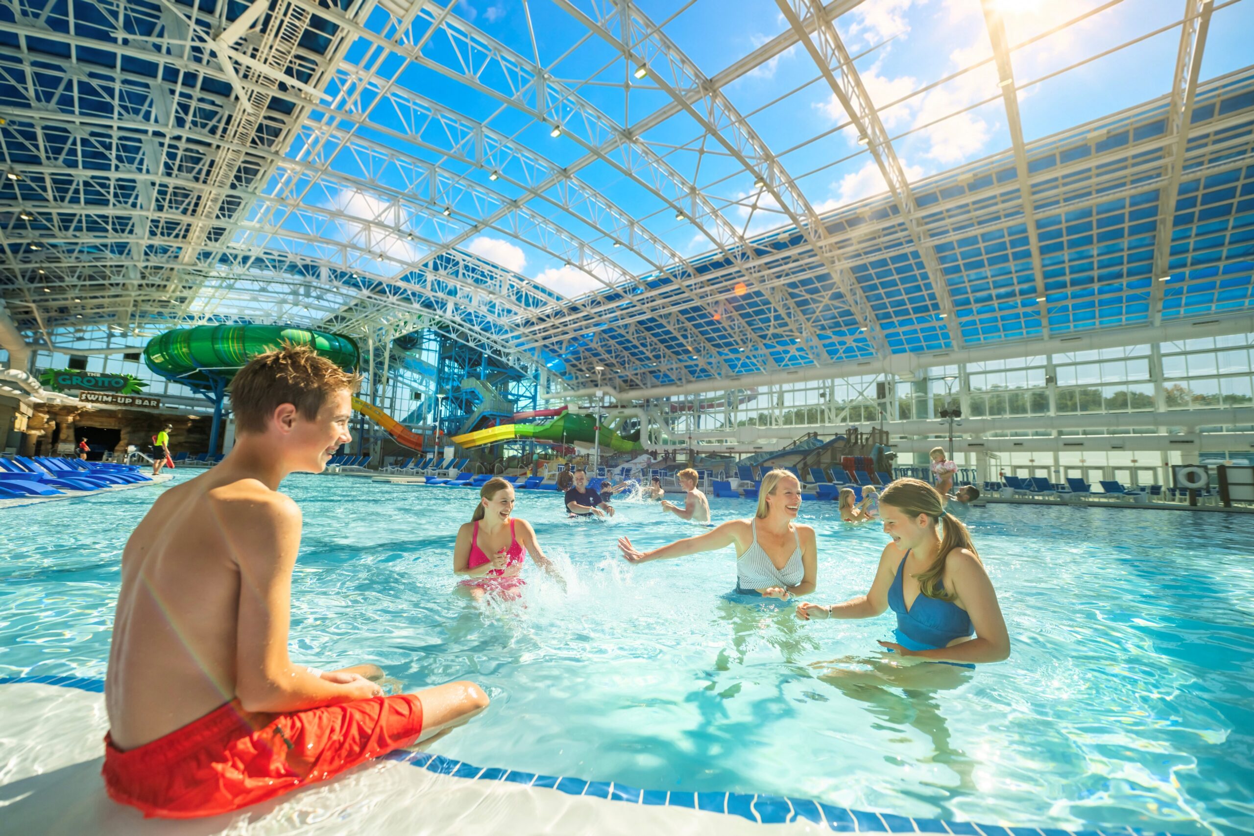 Guests in a pool at an indoor water park