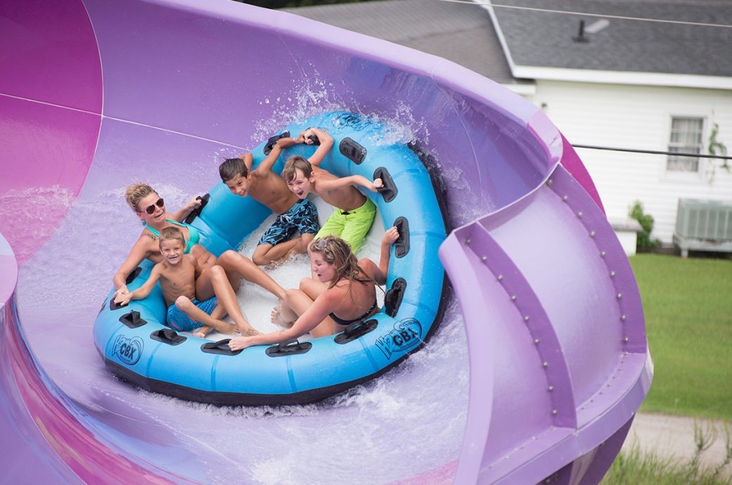 A family is taking an exciting raft ride