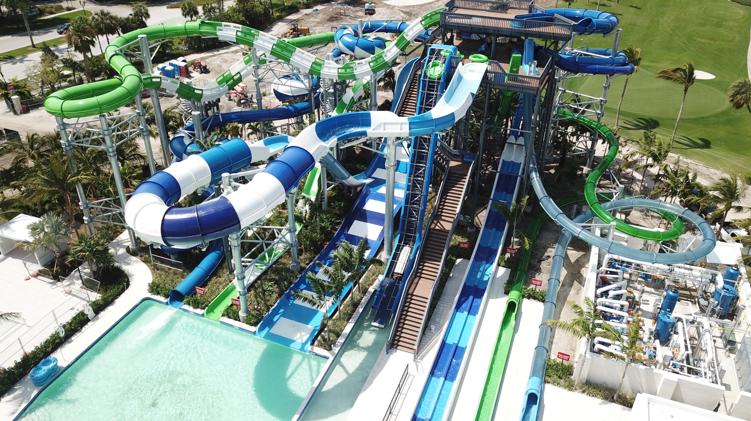 blue and white slide tower with water coaster and Boomerango