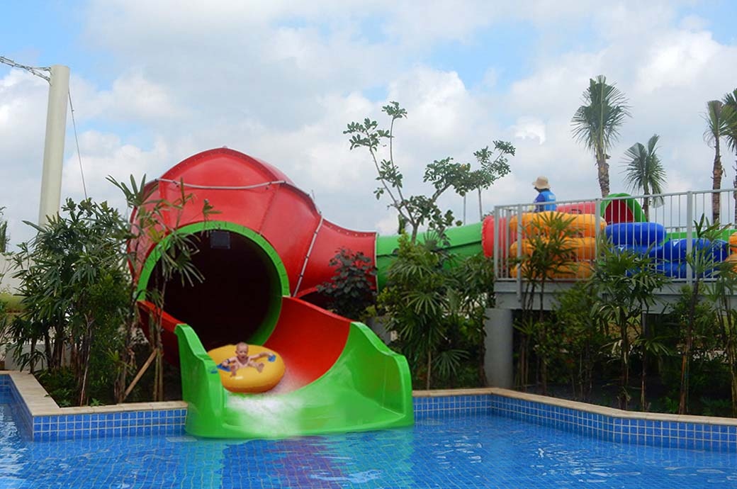 Kid having fun at the best Mini AquaSphere Kids Water Slide by WhiteWater West- GoWet Water Adventure, Jakarta, Indonesia