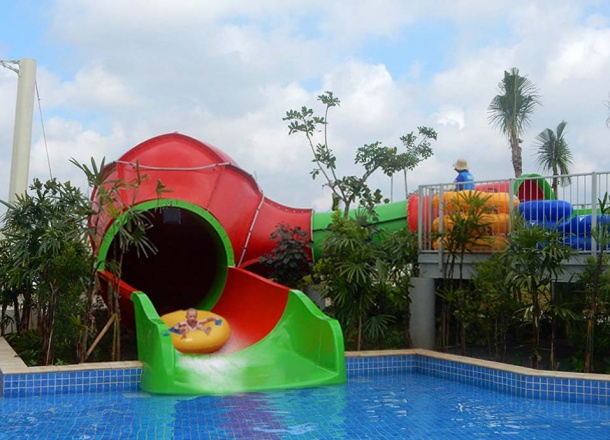 Kid having fun at the best Mini AquaSphere Kids Water Slide by WhiteWater West- GoWet Water Adventure, Jakarta, Indonesia