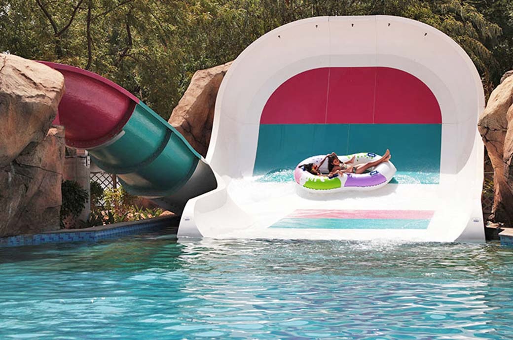 Kids having fun at the best Kids Water Slide Boomerango by WhiteWater West, Shankus Water Park and Resort, Gujarat, India