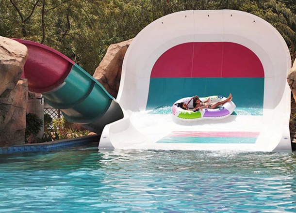 Kids having fun at the best Kids Water Slide Boomerango by WhiteWater West, Shankus Water Park and Resort, Gujarat, India