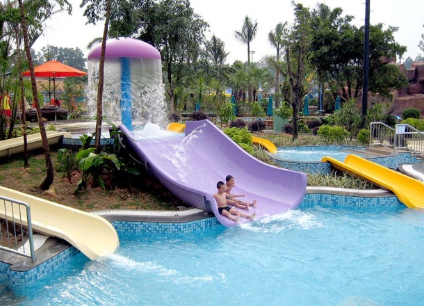 Kids having fun at the best Mini Body Slides for Kids, Kids Water slides by WhiteWater West - Chimelong Waterpark, Guangzhou, China