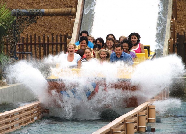 People having fun at the Shoot the Chute - the best Water Ride by WhiteWater West - Legoland, CA, USA