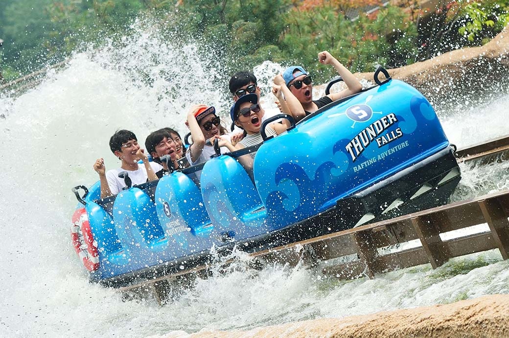 People having fun at the Super Flume - best Water Ride by WhiteWater West - Everland Theme Park, Korea