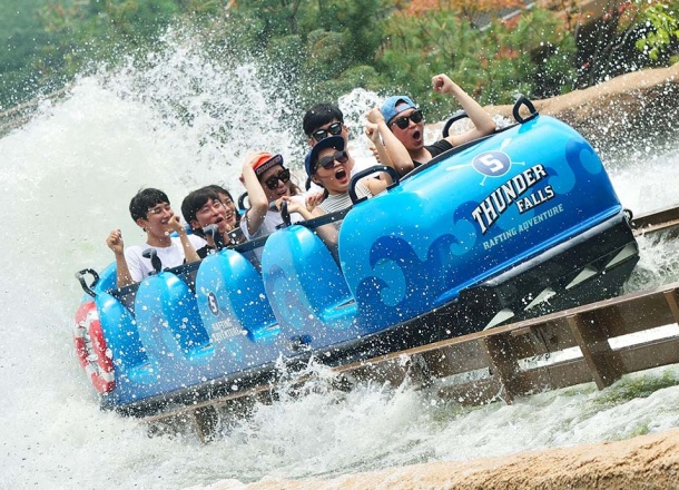 People having fun at the Super Flume - best Water Ride by WhiteWater West - Everland Theme Park, Korea