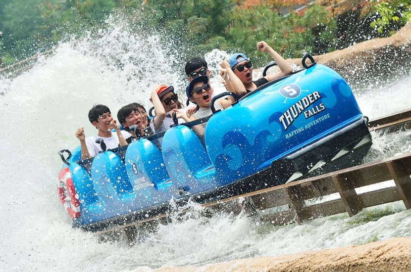 People having fun at the Super Flume - best Water Ride by WhiteWater West - Everland Theme Park, Korea