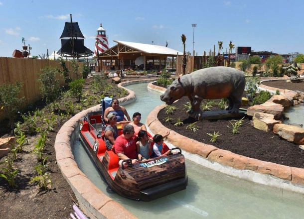 Family having fun at the Water Transportation best Water Ride by WhiteWater West – Morgan’s Inspiration Island, San Antonio, Texas, US