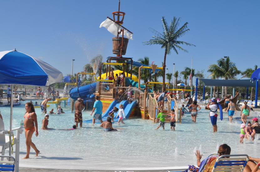 water play structure under blue skies