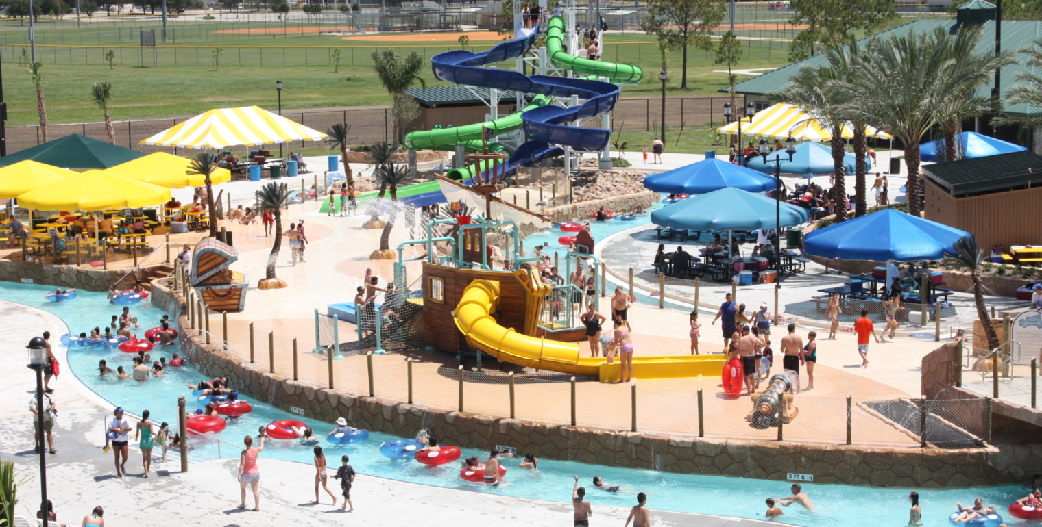 water park with tower, water slides, and lazy river