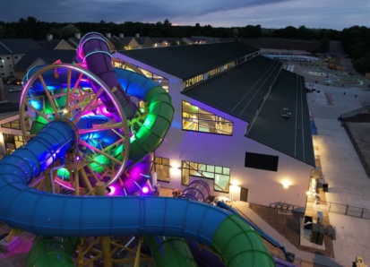 SlideWheel lit up at night with colours
