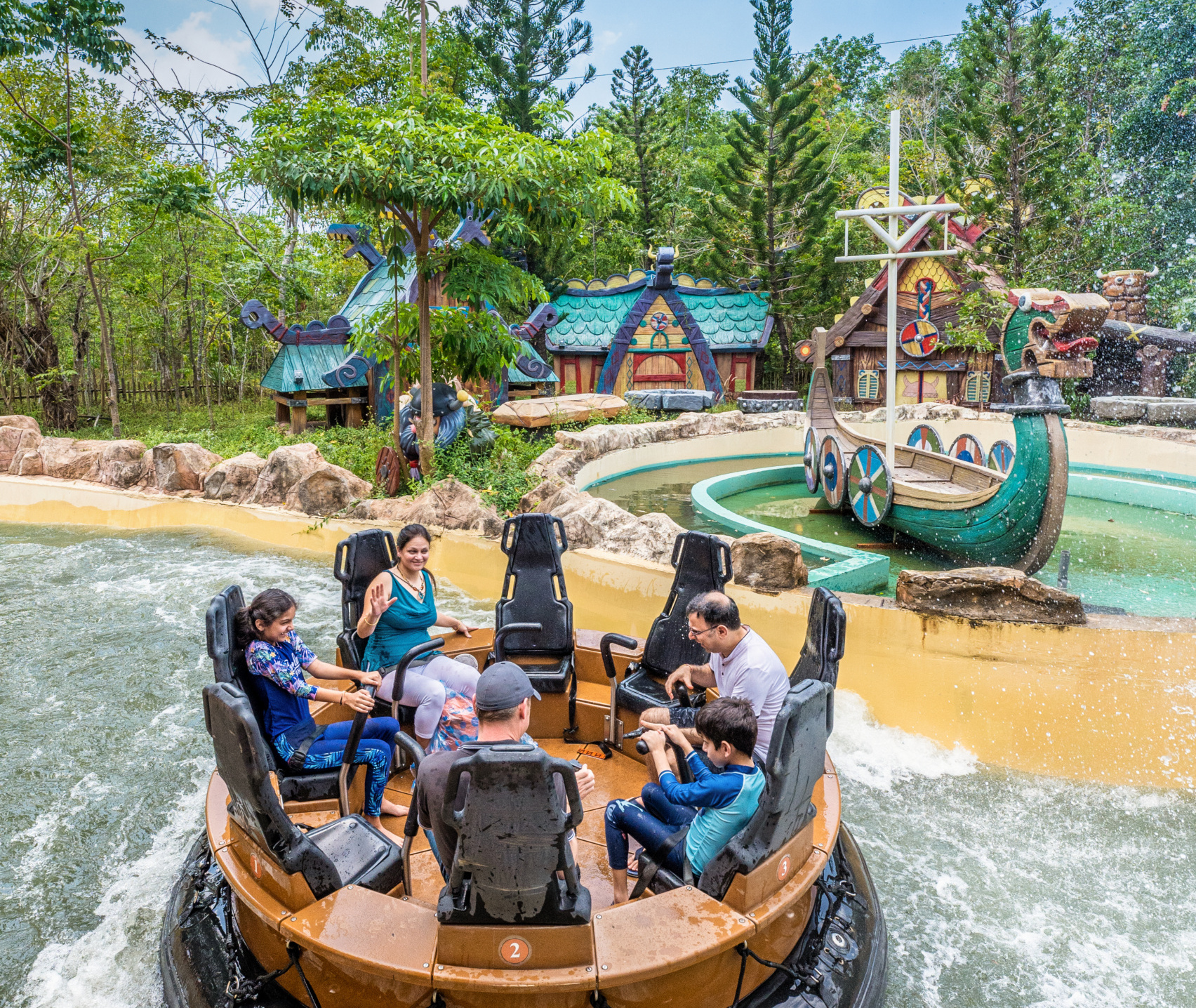 People on a round raft enjoying a water ride